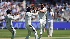 Photo: X | BCCI : India's Nitish Kumar Reddy celebrates with his teammates after taking a wicket on Day 1 of the third Test match against England at Lord's.