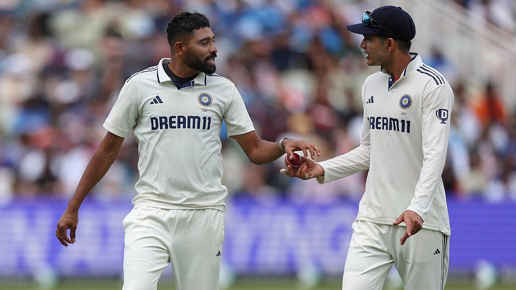AP/Scott Heppell : Mohammed Siraj (left) with Indian Test captain Shubman Gill.