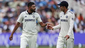 AP/Scott Heppell : Mohammed Siraj (left) with Indian Test captain Shubman Gill.