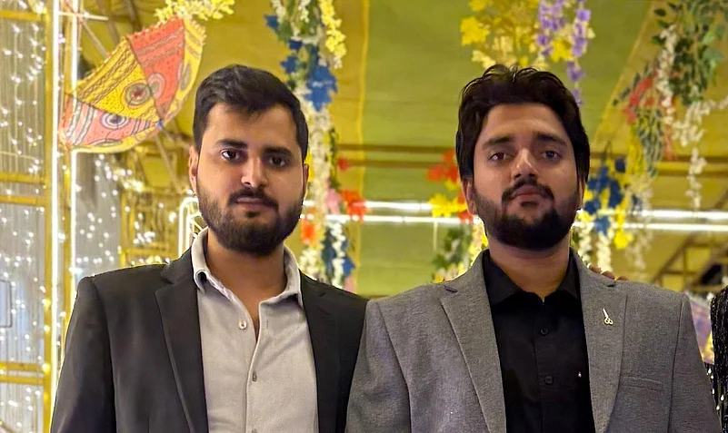 Ayush Raj (Head of Staff, McKayn Consulting) with Aman Dwivedi (CEO)