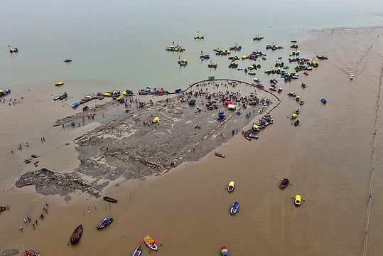 Between Faith And Flood: Life Along The Rising Ganga and Yamuna - In Pictures