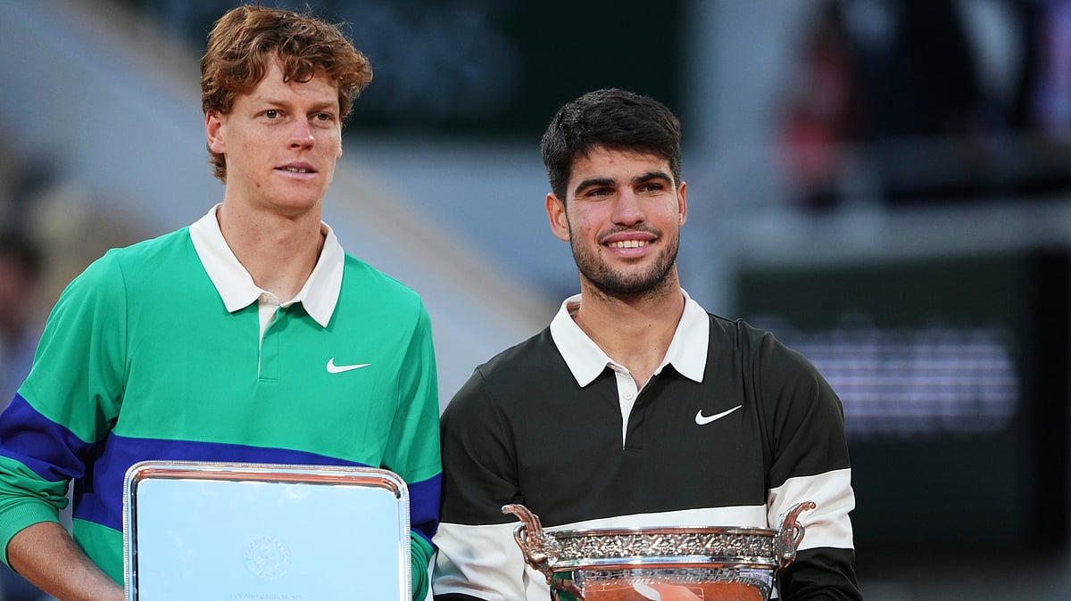 | Photo: AP/Lindsey Wasson : Jannik Sinner vs Carlos Alcaraz, Wimbledon 2025: Winner Spain's Carlos Alcaraz, right, and second placed Italy's Jannik Sinner pose with trophies after the final match of the French Open tennis tournament at the Roland-Garros stadium in Paris, Sunday, June 8, 2025.