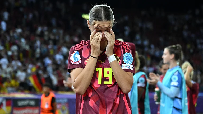 Klara Buhl looks dejected after Germany's heavy defeat - null