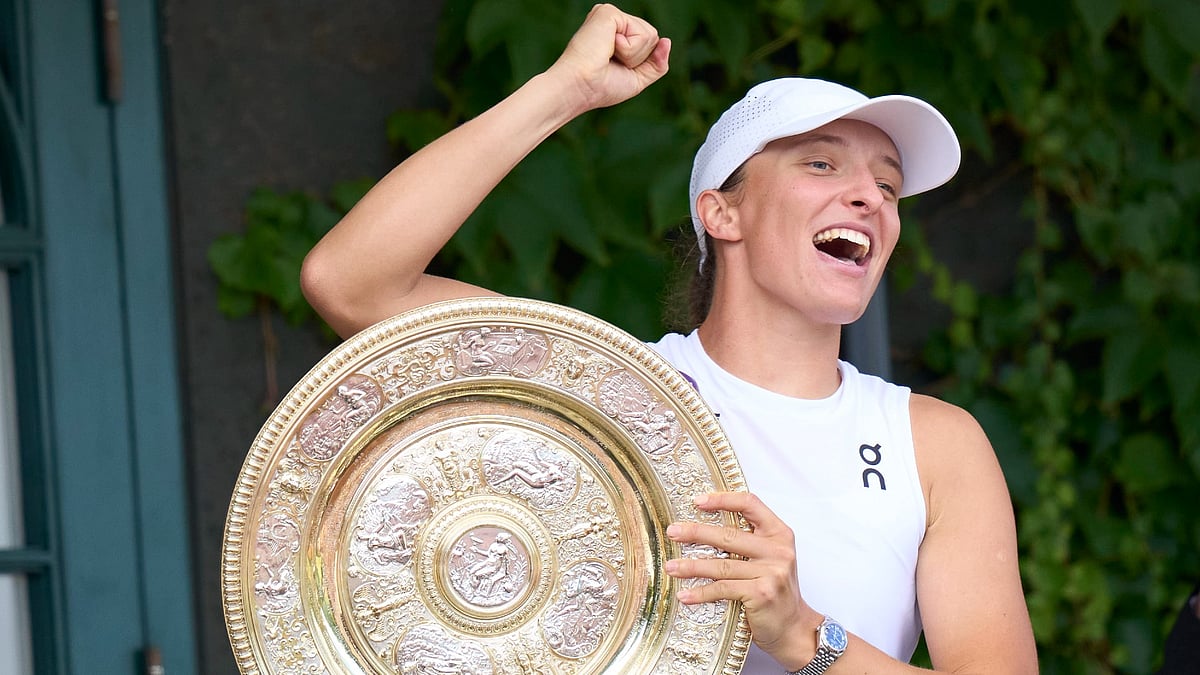 Iga Swiatek celebrates her first Wimbledon title