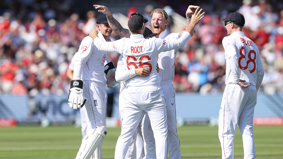 AP Photo/Richard Pelham : England players celebrates the dismissal of India's Karun Nair during the third cricket test match between England and India at Lord's cricket ground in London, Friday.