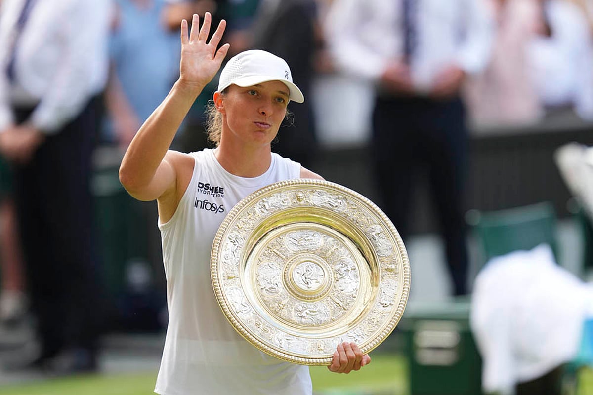 Wimbledon 2025 Tennis women's Final Iga Swiatek of Poland holds the trophy