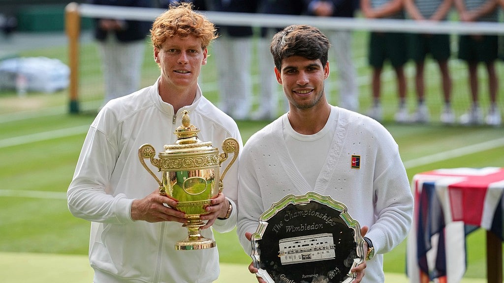 Photo: AP : Jannik Sinner vs Carlos Alcaraz Highlights, Wimbledon 2025 final: The Italian beat the Spaniard 4-6, 6-4, 6-4, 6-4 at the All England Club's Centre Court.