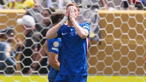Chelsea's Cole Palmer reacts after a miss during the Club World Cup final soccer match between Chelsea and PSG in East Rutherford, N.J., Monday, July 14, 2025.
