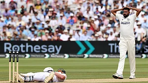 AP/Richard Pelham : England's captain Ben Stokes lies on ground after a delivery from India's Mohammed Siraj