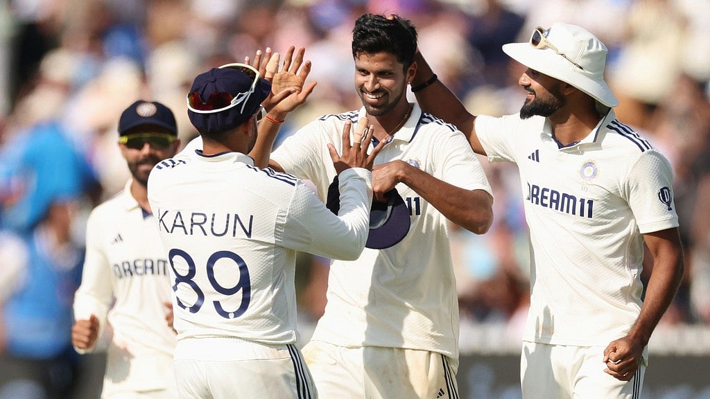 AP : India vs England 3rd Test, Day 4 Innings Report: Washington Sundar (centre) celebrates with teammates after dismissing Shoaib Bashir at Lord's.