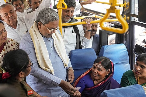 Karnataka CM distributes free bus tickets in Bengaluru