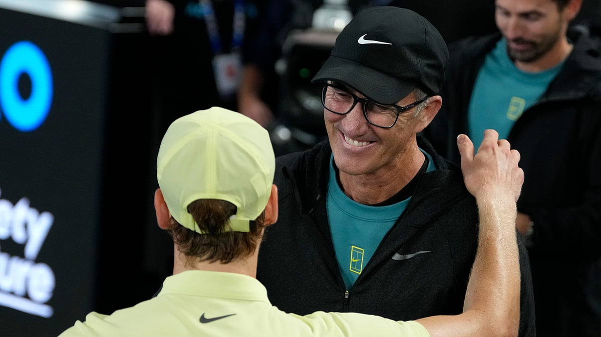  (AP Photo/Asanka Brendon Ratnayake, File) : FILE - Jannik Sinner of Italy celebrates with coach Darren Cahill, right, after defeating Alexander Zverev of Germany in the men's singles final at the Australian Open tennis championship in Melbourne, Australia, Sunday, Jan. 26, 2025.