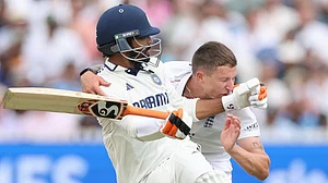 Photo: AP : India vs England, 3rd Test Day 5: Ravindra Jadeja (left) and Brydon Carse collide at Lord's.