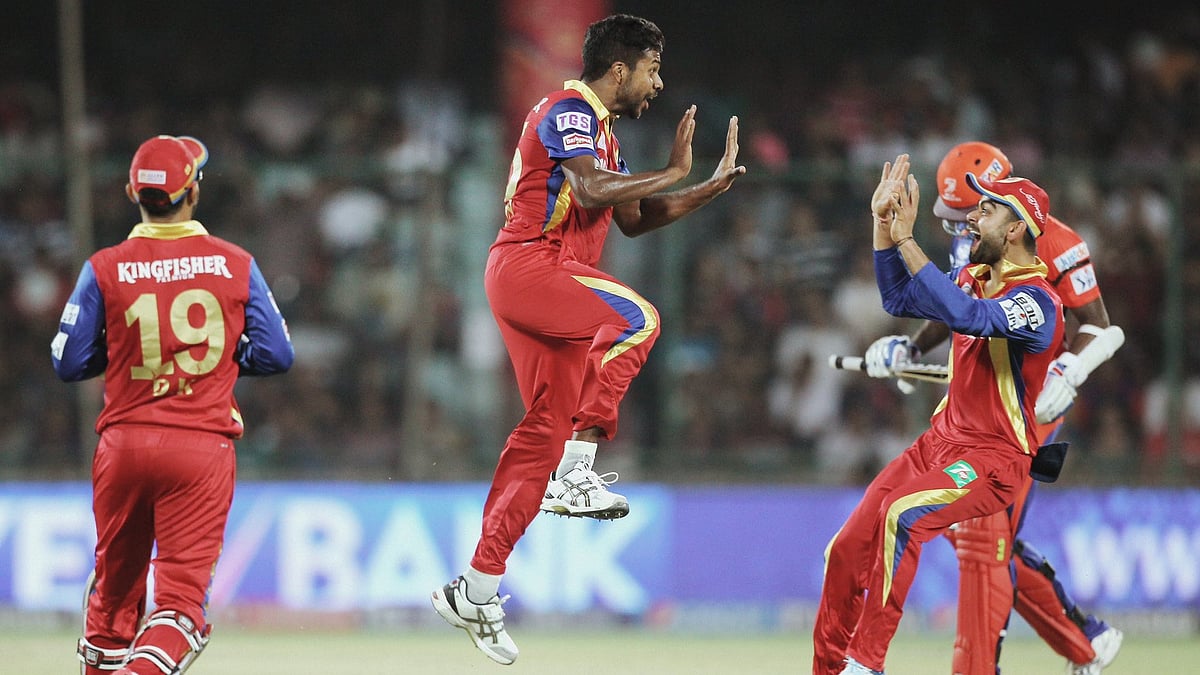 | Photo: X/VarunAaron : File photo of Varun Aaron in action for Royal Challengers Bengaluru in IPL.