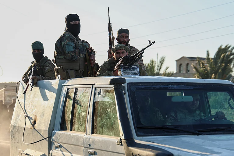 Syrian government forces deploy at the Mazraa village on the outskirts of city of Sweida, where clashes erupted between Sunni Bedouin clans and Druze militias, southern Syria. - AP Photo/Ghaith Alsayed