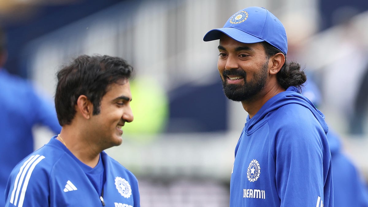 Indias KL Rahul, right, warms up as he shares a light moment. AP