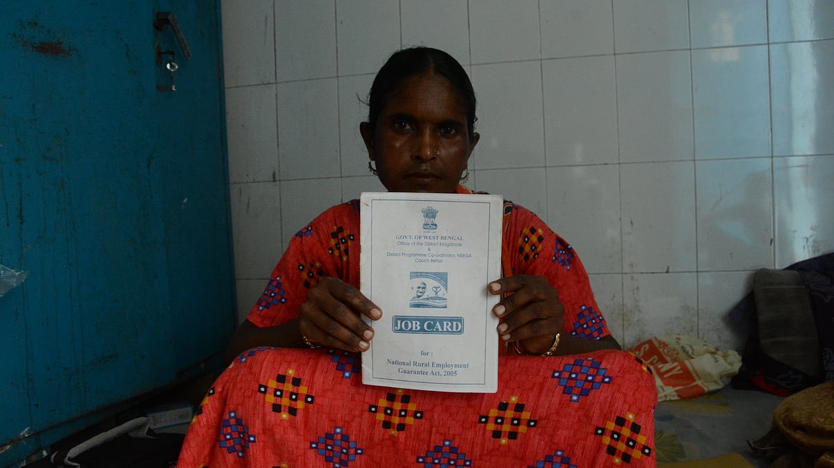 Fatima shows her Job card also known as Labour card provided to her by the state of West Bengal