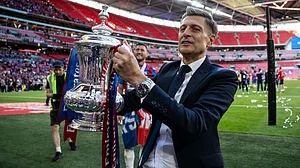 Steve Parish holds the FA Cup trophy at Wembley