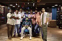 CEO Vikash Manoharan in centre with the core team at TourOn