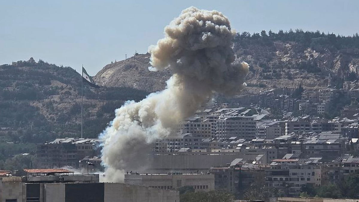 SANA via AP : In this photo released by the Syrian official news agency SANA, smoke rises from an Israeli airstrike that hit the Syrian Defence Ministry, in Damascus, Syria, Wednesday, July 16, 2025. 