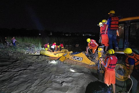 NDRF rescues people stuck in overflowing drain
