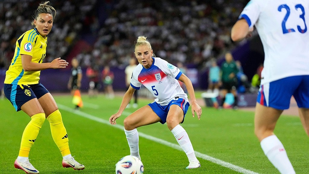 AP : England's Alex Greenwood and Sweden's Johanna Rytting Kaneryd, left, eye the ball during the Women's Euro 2025 quarterfinals soccer match between Sweden and England at Stadion Letzigrund in Zurich.