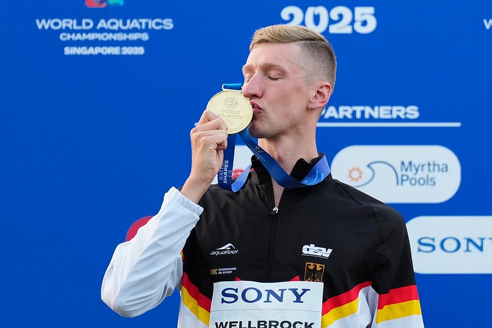 | Photo: AP/Vincent Thian : World Swimming Championships 2025