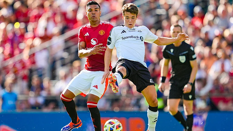 Sverre Nypan playing against Manchester United in a friendly - null