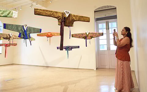 They carry traces of previous wear, of use, of care, of invisibility.