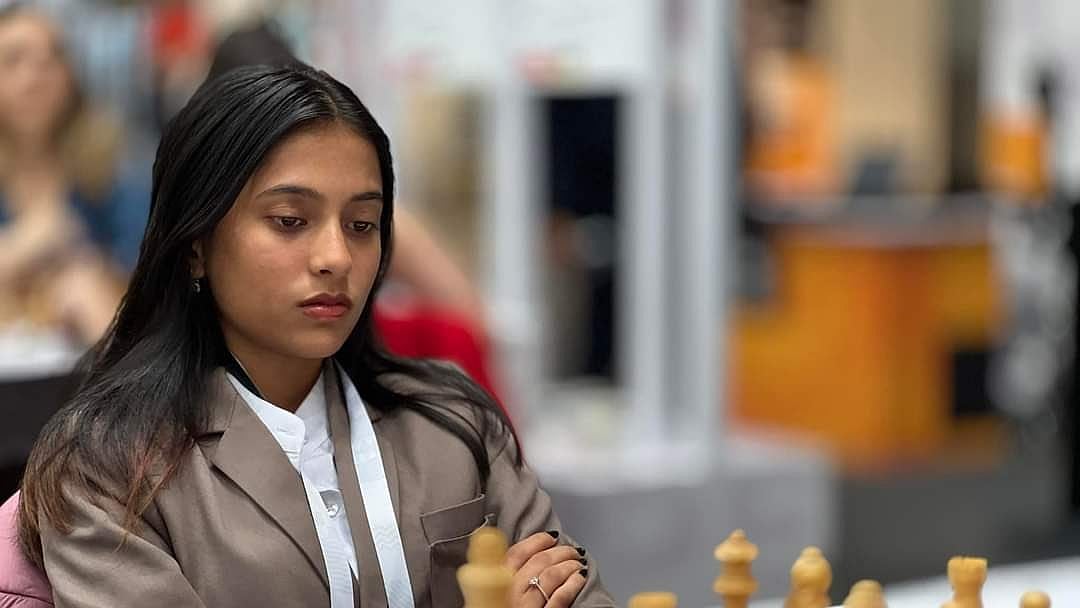 Photo: X | Sports India : FIDE Grand Swiss Round 8: Indian chess player Divya Deshmukh during a game.