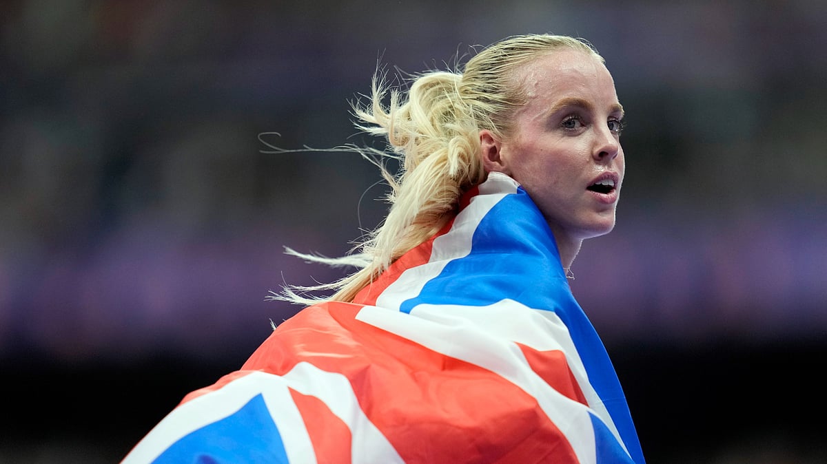 (AP Photo/Ashley Landis, File) : FILE - Keely Hodgkinson, of Britain, celebrates after winning the gold medal in the women's 800 meters final at the 2024 Summer Olympics, Aug. 5, 2024, in Saint-Denis, France. 
