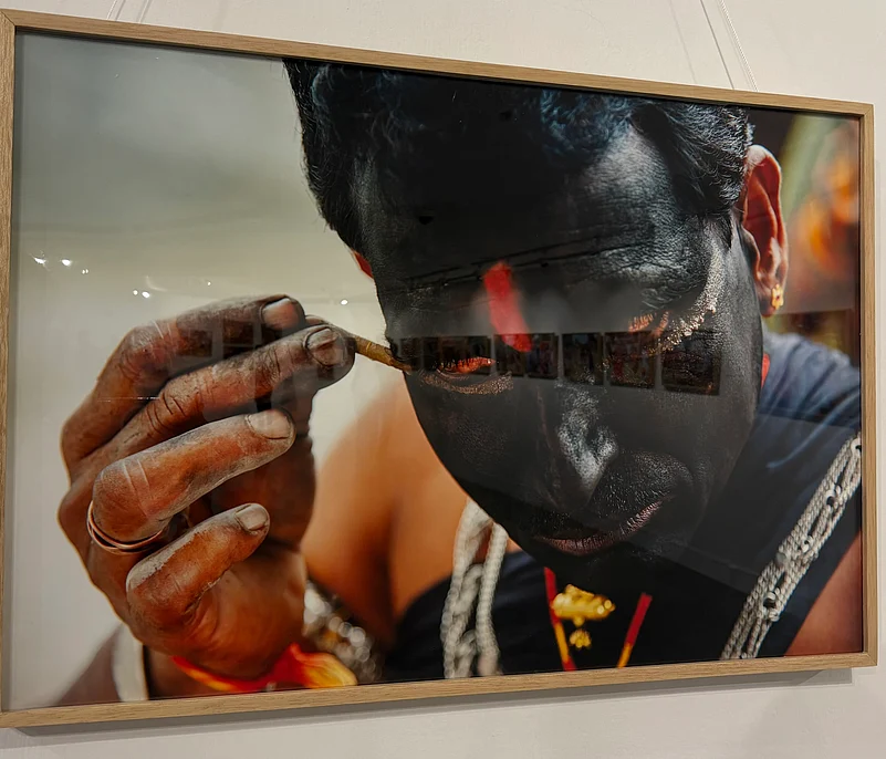 Man applying makeup for the festival
