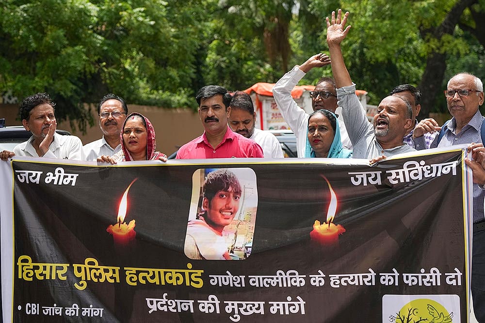 | Photo: PTI/Atul Yadav : Protest over Dalit youth's death in Hisar
