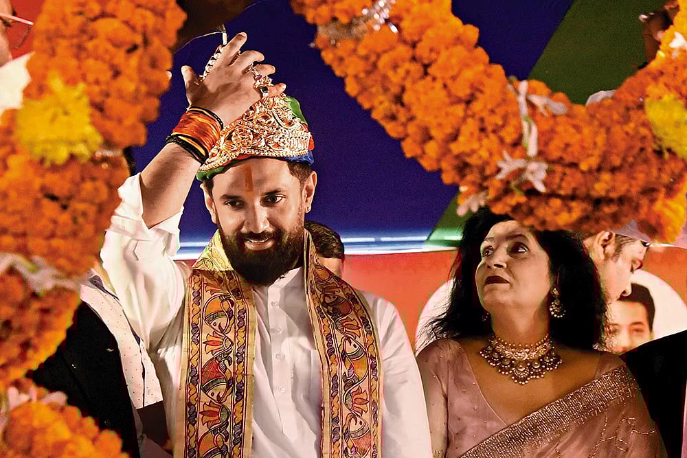 Political Game: Chirag Paswan being honoured during the foundation day of his party in Patna   - | Photo: Getty Images