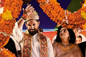 | Photo: Getty Images : Political Game: Chirag Paswan being honoured during the foundation day of his party in Patna