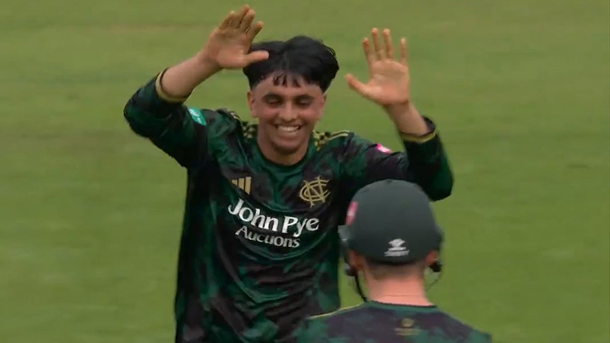 Vitality Blast screengrab : Farhan Ahmed (left) celebrates his hat-trick against Lancashire with Nottinghamshire wicket-keeper Tom Moores.
