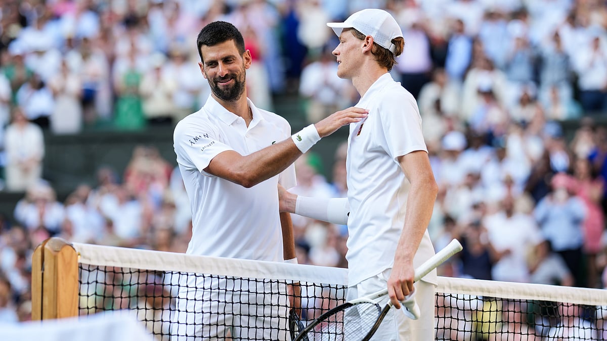 Novak Djokovic and Jannik Sinner pictured after their Wimbledon semi-final