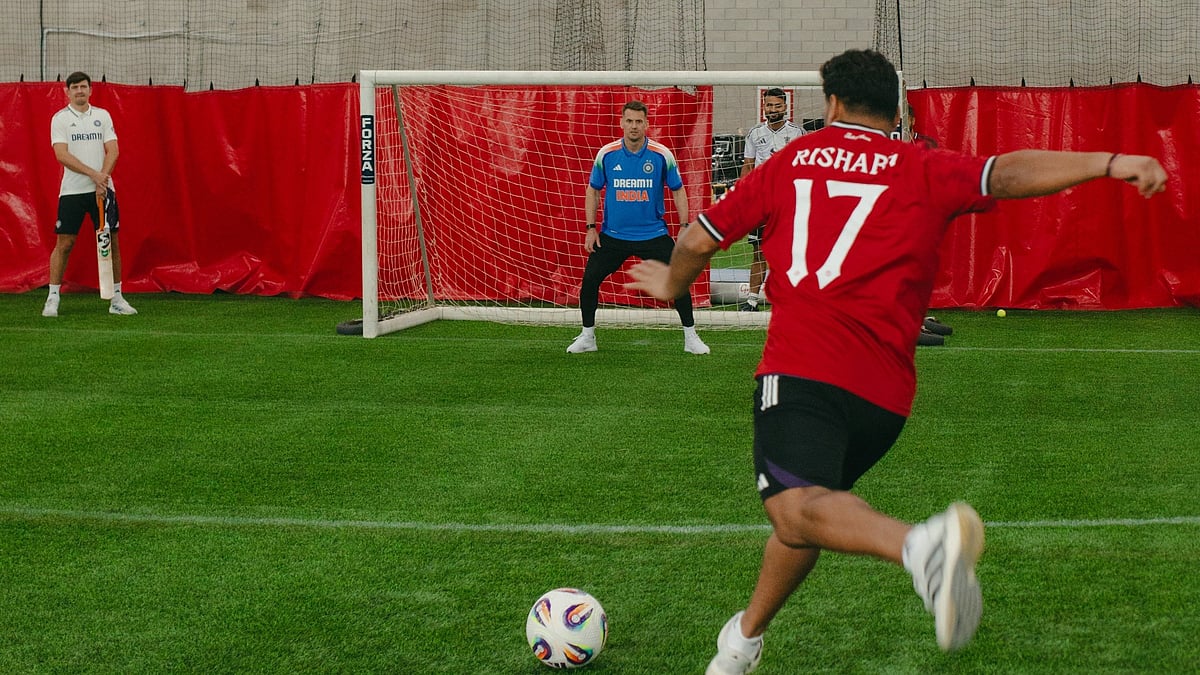Photo: X | BCCI : Indian cricket team playing football with the Manchester United football team in Manchester.