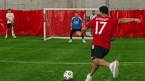 Photo: X | BCCI : Indian cricket team playing football with the Manchester United football team in Manchester.