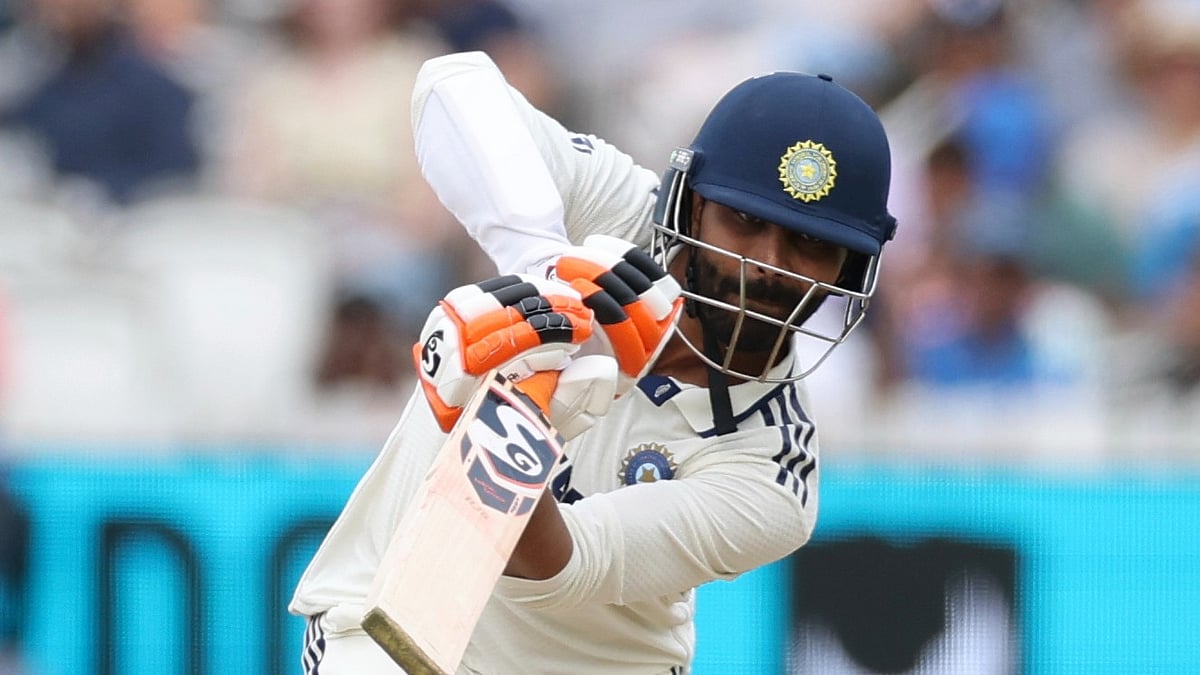 AP Photo/Richard Pelham : India's Ravindra Jadeja plays a shot during the fifth day of the third cricket test match between England and India at Lord's cricket ground in London.