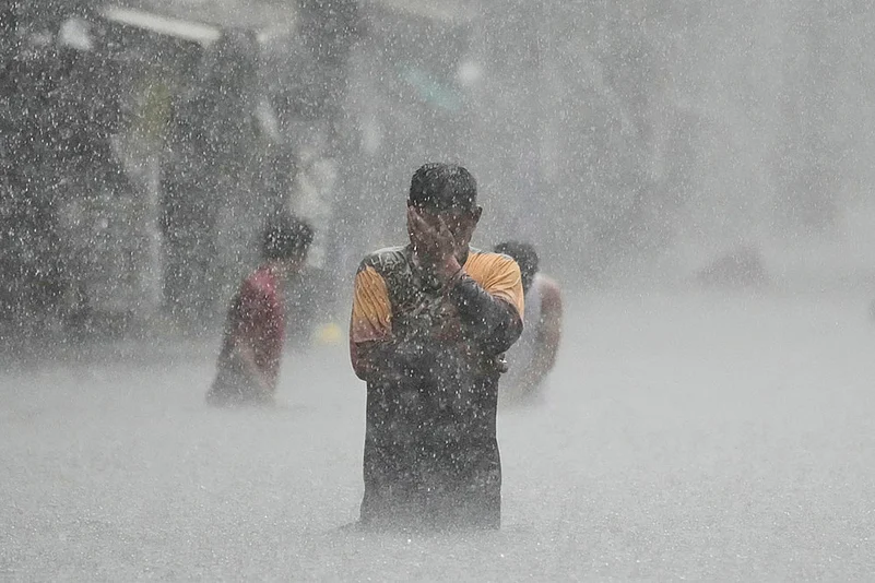 Philippines Asia Storm; Floods after Tropical storm Wipha in Quezon city_waist-deep floods