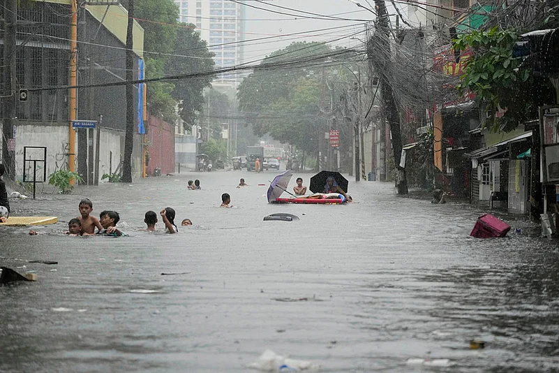 Philippines Asia Storm; Floods after Tropical storm Wipha in Quezon city_intensified monsoon rains