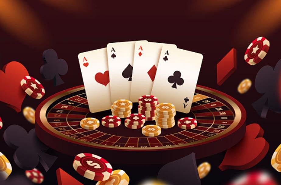Poker cards and chips on roulette wheel