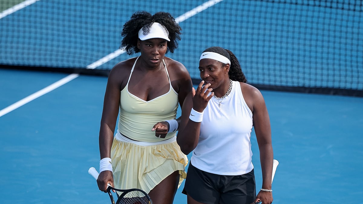 Venus Williams with doubles partner Hailey Baptiste