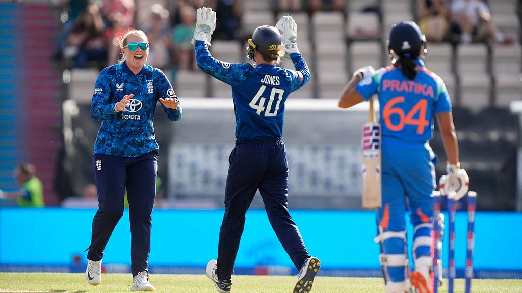Andrew Matthews/PA via AP : India Women Vs England Women, 3rd ODI Preview: Sophie Ecclestone, left, celebrates with Amy Jones after taking the wicket of Pratika Rawal.