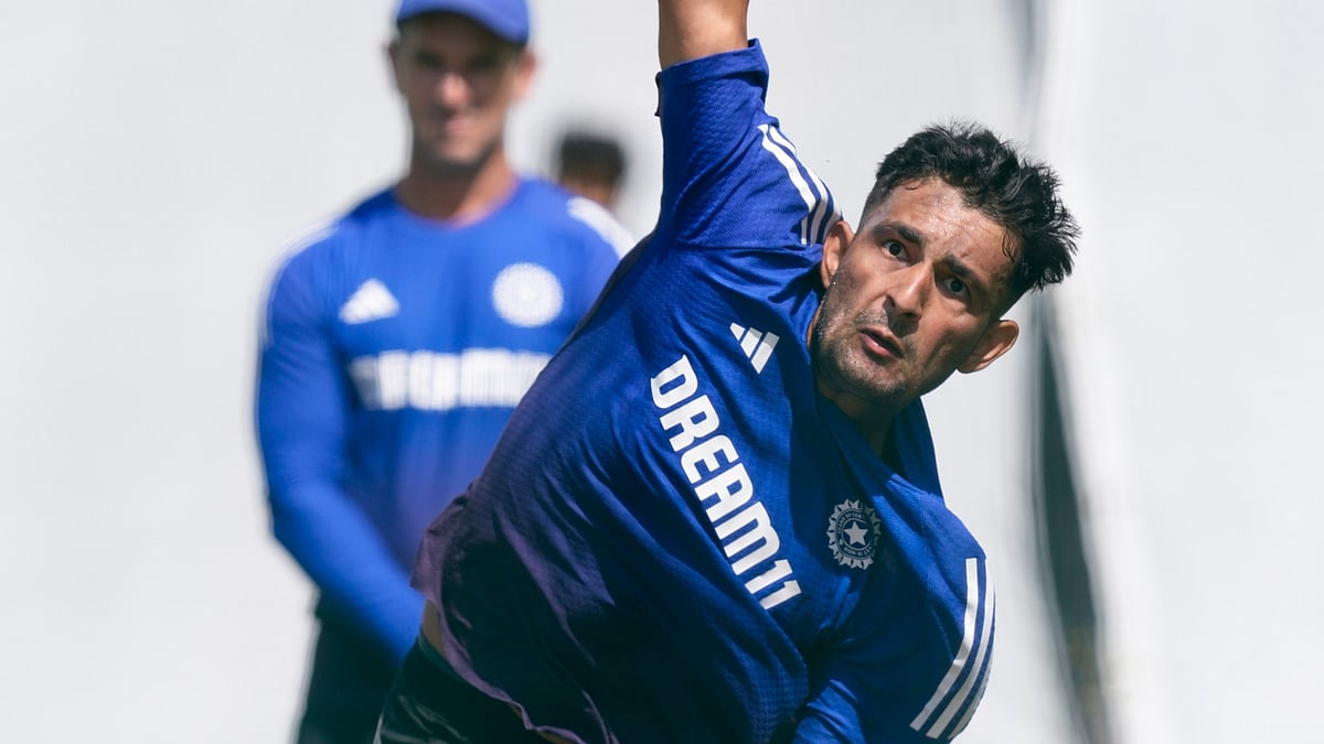 PTI : Anshul Kamboj bowls in the nets in Manchester.