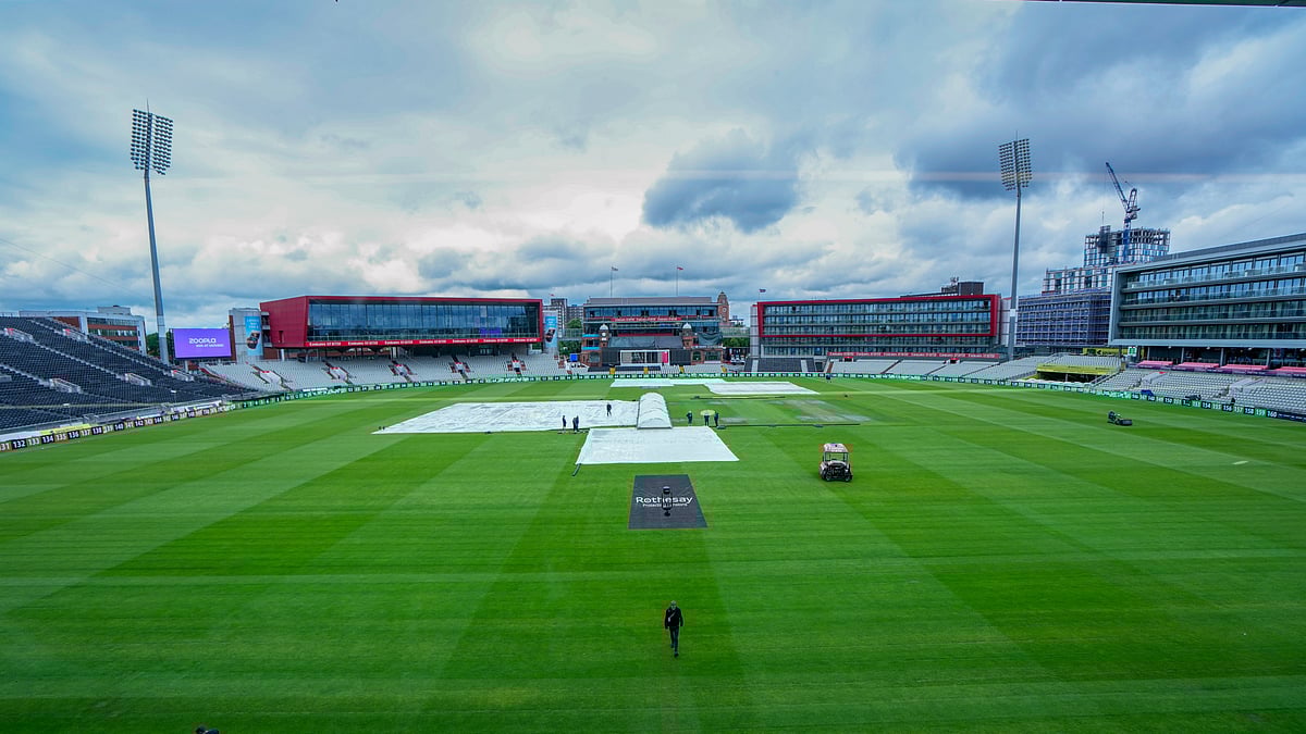 PTI : India Vs England, 4th Test Day 1 Weather Forecast: Ground staff cover the pitch in Manchester.