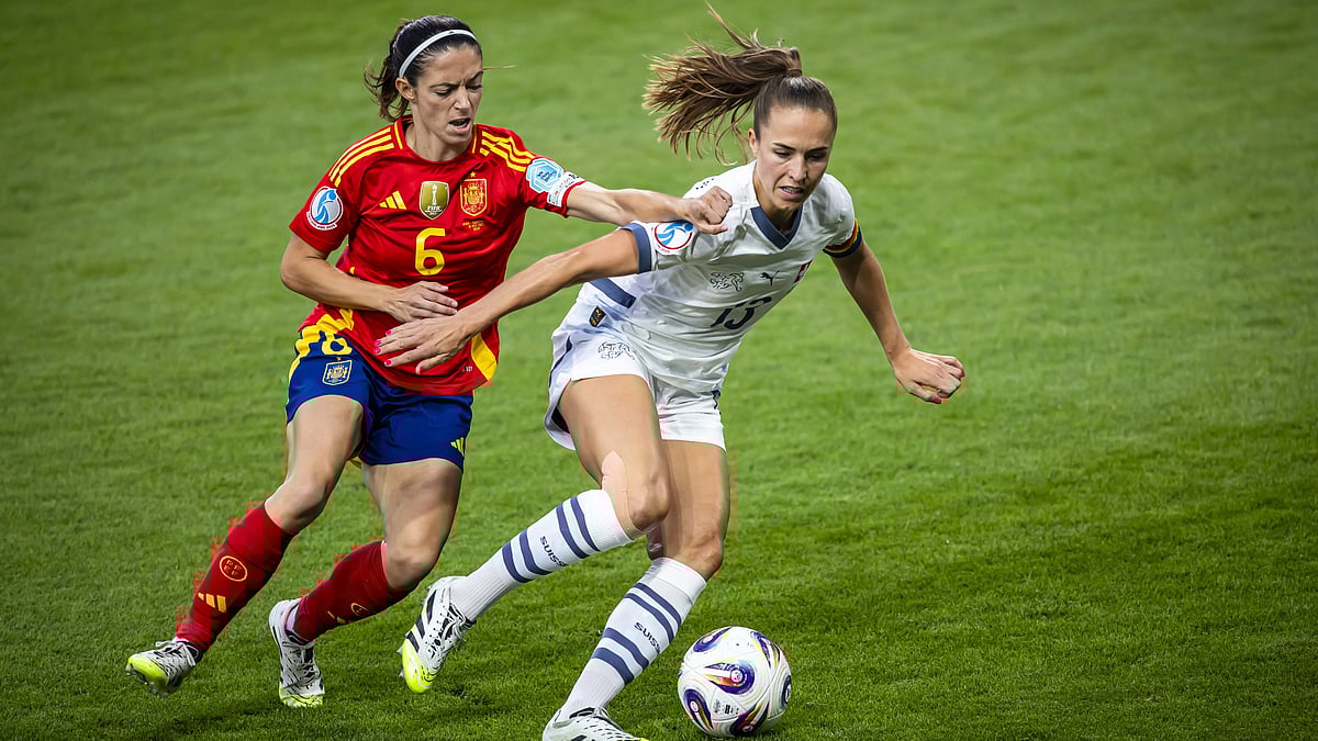 | Photo: Michael Buholzer/Keystone via AP : Germany vs Spain, UEFA Women's Euro 2025 Semi-Final: Spain's Aitana Bonmati fights for the ball with Switzerland's Lia Waelti , right, during the Women's Euro 2025 quarterfinals soccer match between Spain and Switzerland at Stadion Wankdorf in Bern, Switzerland, Friday, July 18, 2025. 