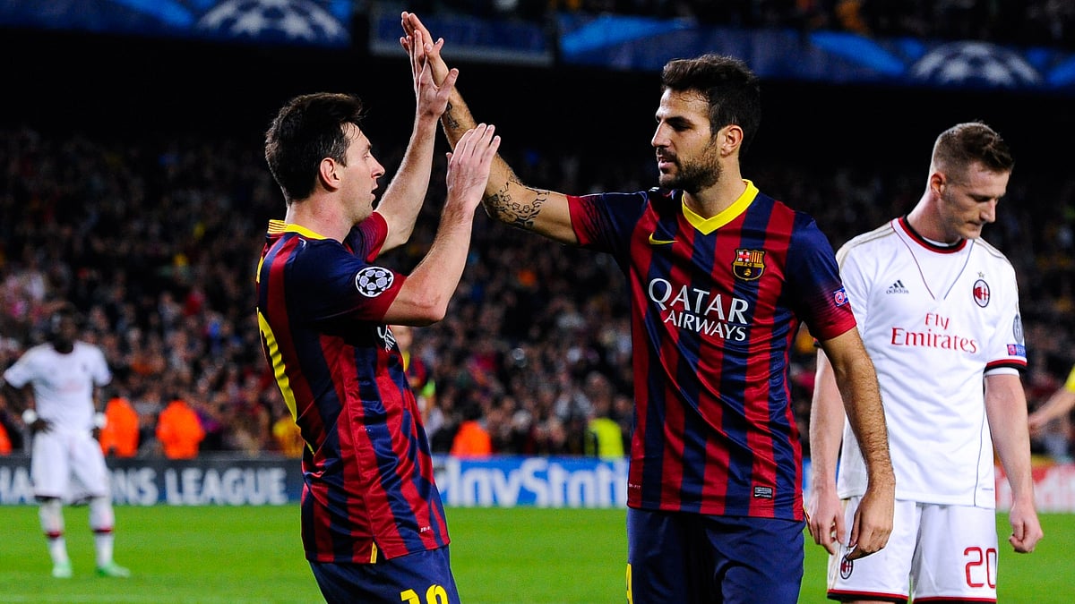Cesc Fabregas and Lionel Messi were Barcelona team-mates for three years - null