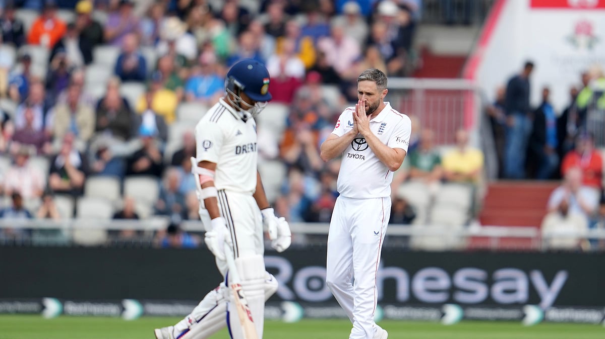 AP Photo/Jon Super : England's Chris Woakes reacts after bowls a delivery on the first day of the fourth cricket test match between England and India at Emirates Old Trafford, Manchester, England.